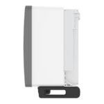 Side view of a white desktop printer with a gray side panel mounted on a black base/stand.